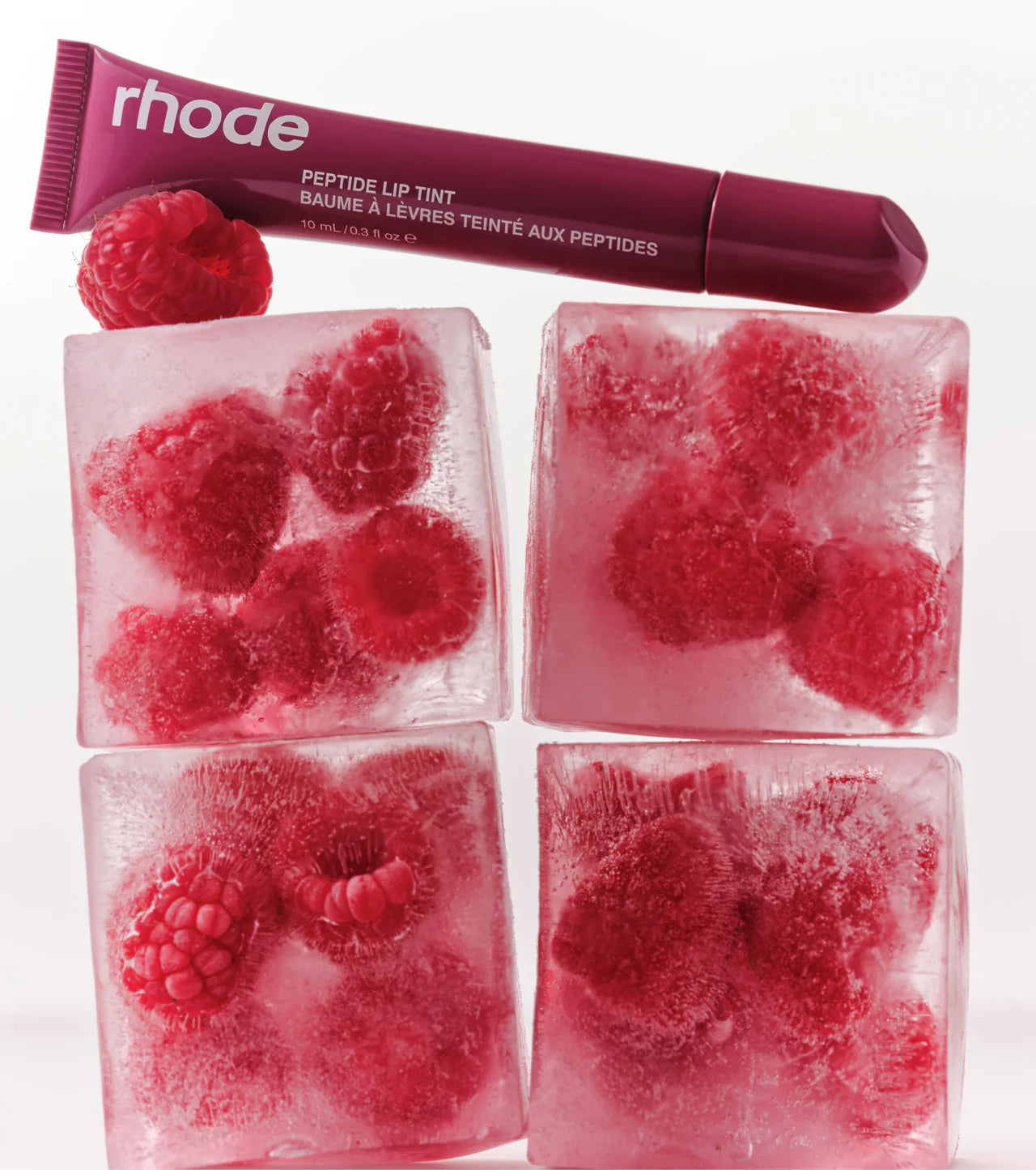 R H O D E Peptide Lip Tint In Raspberry jelly